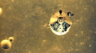 The Apollo 11 space module above the surface of the moon. The Apollo 11 space module above the surface of the moon.