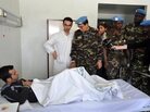 Members of the U.N. observers mission in Syria visit wounded soldiers and policemen at Tishreen Military Hospital in Damascus on May 23. Casualties among Syrian government forces are rising sharply. Members of the U.N. observers mission in Syria visit wounded soldiers and policemen at Tishreen Military Hospital in Damascus on May 23. Casualties among Syrian government forces are rising sharply.