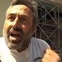 "We are not animals!" this man told U.N. monitors in Syria.