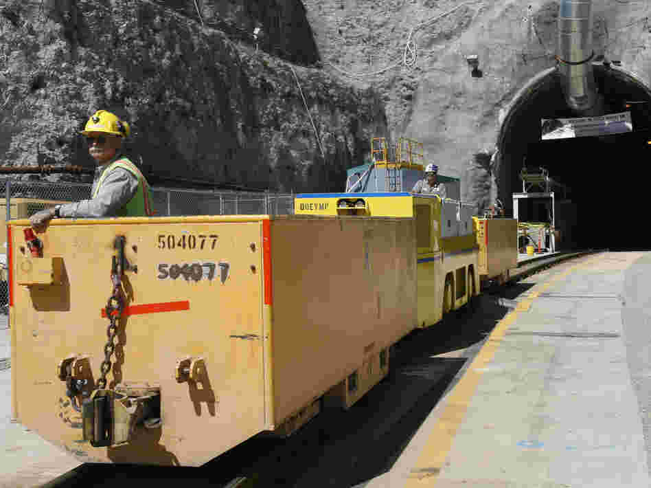 Pete Vavricka conducts an underground train from the entrance of Yucca Mountain in Nevada in 2006. President Obama canceled the planned nuclear waste repository there in 2009.
