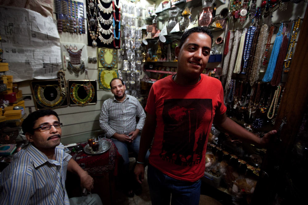 Scenes from the Khan el-Khalili market in downtown Cairo. Karim Gomma (right), a shop worker, says he's voting for the Muslim Brotherhood candidate, Mohammed Mursi. But he says most shop owners are voting for Ahmed Shafiq because he has promised to restore law and order.