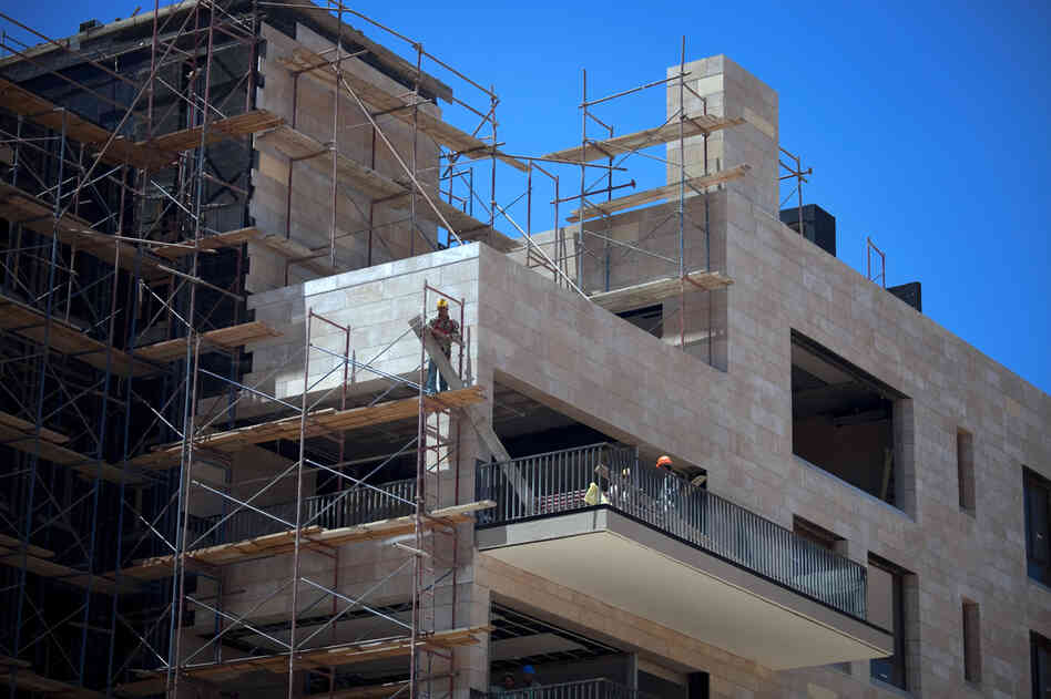 Building construction in the upscale SODIC housing development outside Cairo.