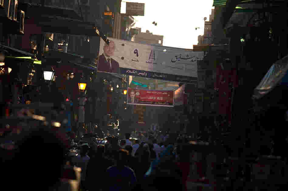 The Khan el-Khalili market in downtown Cairo. Election posters for the two candidates in Egypt's presidential runoff election are hanging above the street.