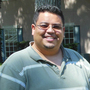 U.S.-born Angel Luis Cruz, the son of Dominican immigrants, owns an insurance company in South Carolina. He says anti-illegal immigration laws have hurt his business. U.S.-born Angel Luis Cruz, the son of Dominican immigrants, owns an insurance company in South Carolina. He says anti-illegal immigration laws have hurt his business.