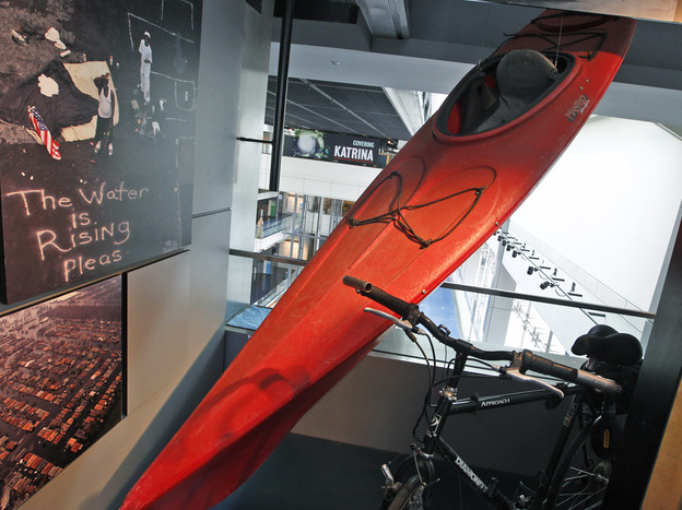 A kayak used by Times-Picayune photographer John McCusker to cover Hurricane Katrina is displayed at the Newseum in Washington, D.C., in 2010. McCusker, who worked for the paper for 25 years, is being laid off.