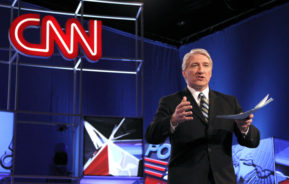 Moderator from CNN John King speaks to the crowd before a Republican presidential debate.