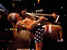 Axl Rose onstage. In American flag bike shorts. Axl Rose onstage. In American flag bike shorts.