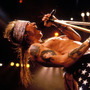 Axl Rose onstage. In American flag bike shorts. Axl Rose onstage. In American flag bike shorts.