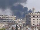 A frame grab from a video taken by U.N. observers as smoke rose over the Syrian city of Homs earlier this week. The observers said Homs had been shelled by Syrian government forces. A frame grab from a video taken by U.N. observers as smoke rose over the Syrian city of Homs earlier this week. The observers said Homs had been shelled by Syrian government forces.