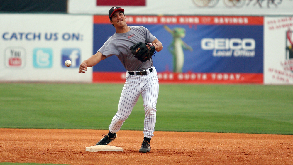 Tyler Saladino, 22, makes a throw from second base during warm-ups with the AA Birmingham Barons.