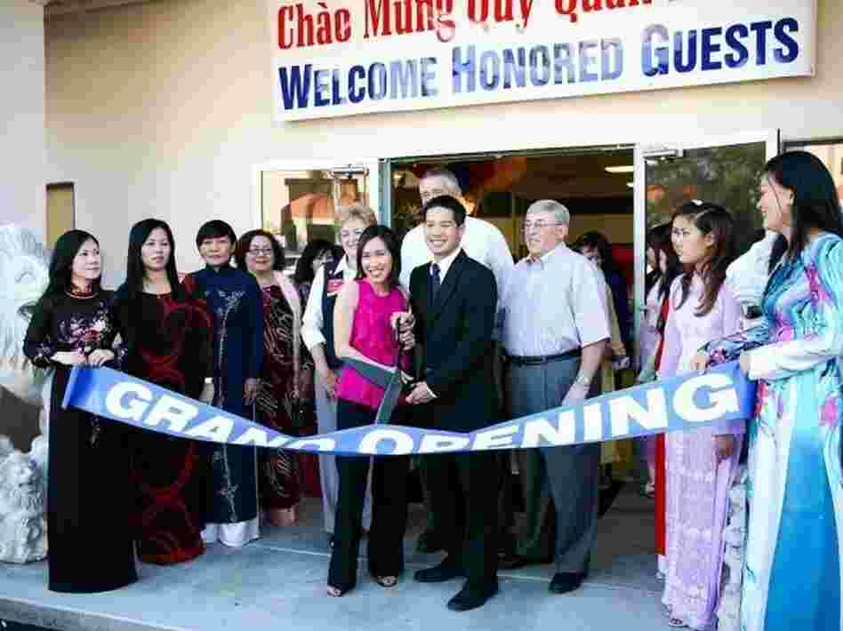 Tam Nguyen (center right) and his sister Linh run the Advance Beauty College in Garden Grove, Calif.