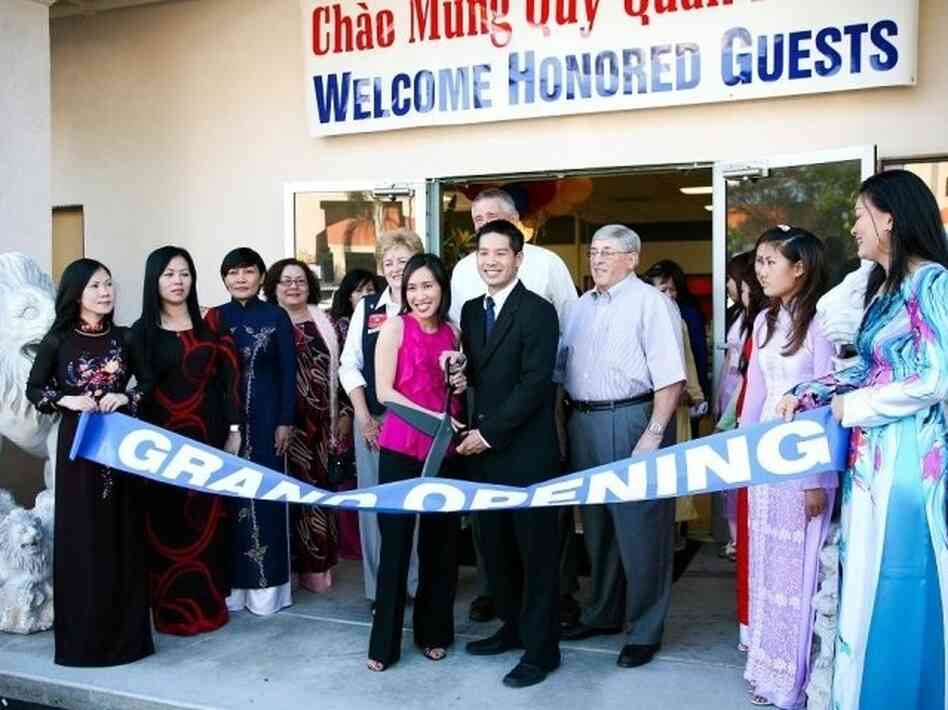 Tam Nguyen (center right) and his sister Linh run the Advance Beauty College in Garden Grove, Calif.