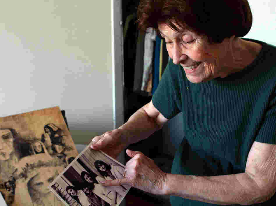 Elsa Sanchez de Oesterheld, 87, looks at pictures of her four daughters who were killed by the military dictatorship. Two of the daughters were pregnant when they were seized, but Oesterheld still does not know what happened to the babies.