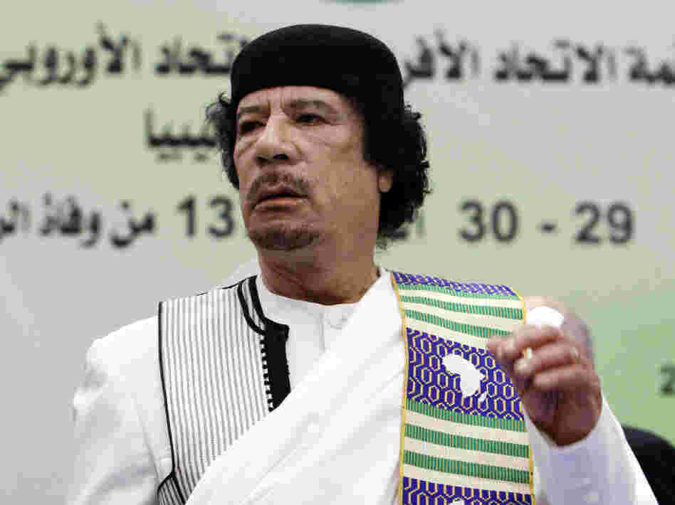 Libyan leader Moammar Gadhafi attends the opening session of the Africa-EU summit in November 2010, before the current conflict. Now that the U.S. military has intervened in Libya, many wonder what the endgame is.