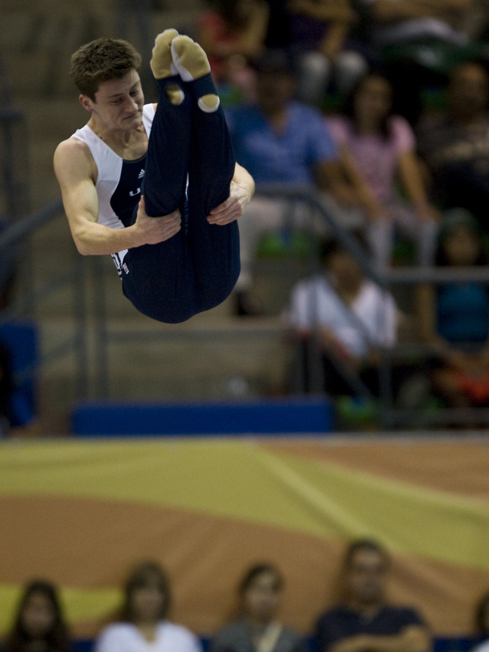 Trampolinist Steven Gluckstein in the pike position during last year's Pan American Games. He and his brother, Jeffrey, will compete for one spot on the U.S. Olympic team.