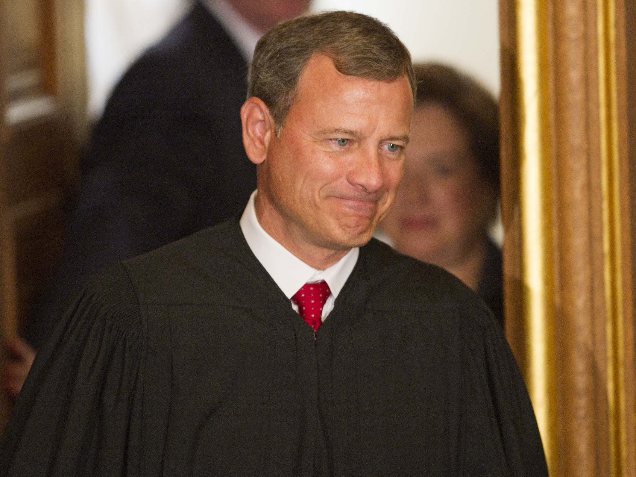 Critics say U.S. Supreme Court Chief Justice John Roberts, shown in 2010, backtracked on previous pledges to give high priority to precedent in the Citizens United campaign finance case. (Image credit: AFP/Getty Images)