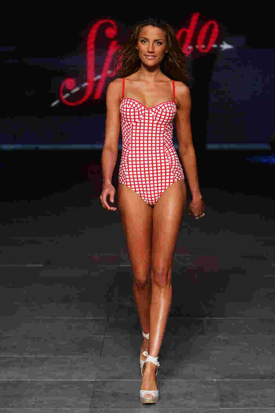 Rachael Finch showcases designs on the catwalk by Speedo as part of Mercedes-Benz Fashion Festival Sydney 2011.