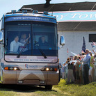 Republican presidential candidate Mitt Romney and his wife, Ann, wave from a campaign bus on Friday at Scamman Farm in Stratham, N.H. Republican presidential candidate Mitt Romney and his wife, Ann, wave from a campaign bus on Friday at Scamman Farm in Stratham, N.H.