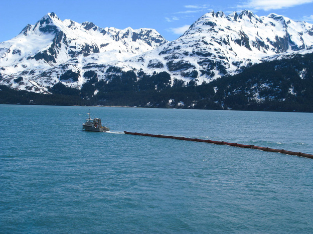 The first step in responding to oil spills is to try to ring the oil with floating booms.
