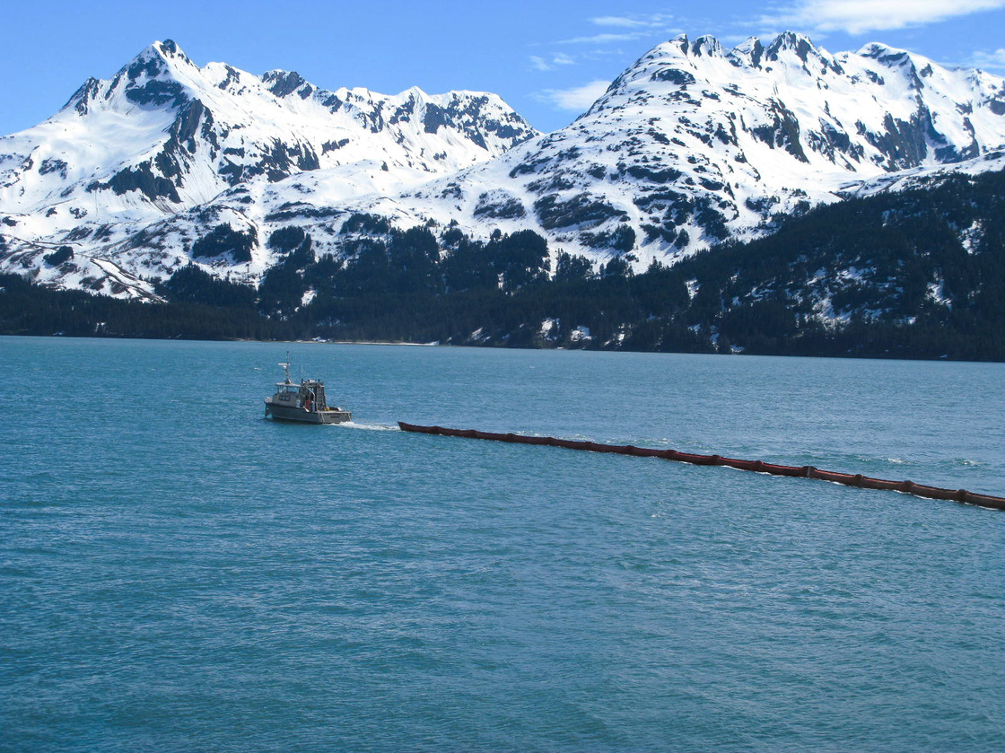 The first step in responding to oil spills is to try to ring the oil with floating booms.