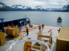 Trainees with Royal Dutch Shell learn to deploy oil spill booms in the waters near the port of Valdez in Alaska. The company is training about 200 spill responders. Trainees with Royal Dutch Shell learn to deploy oil spill booms in the waters near the port of Valdez in Alaska. The company is training about 200 spill responders.