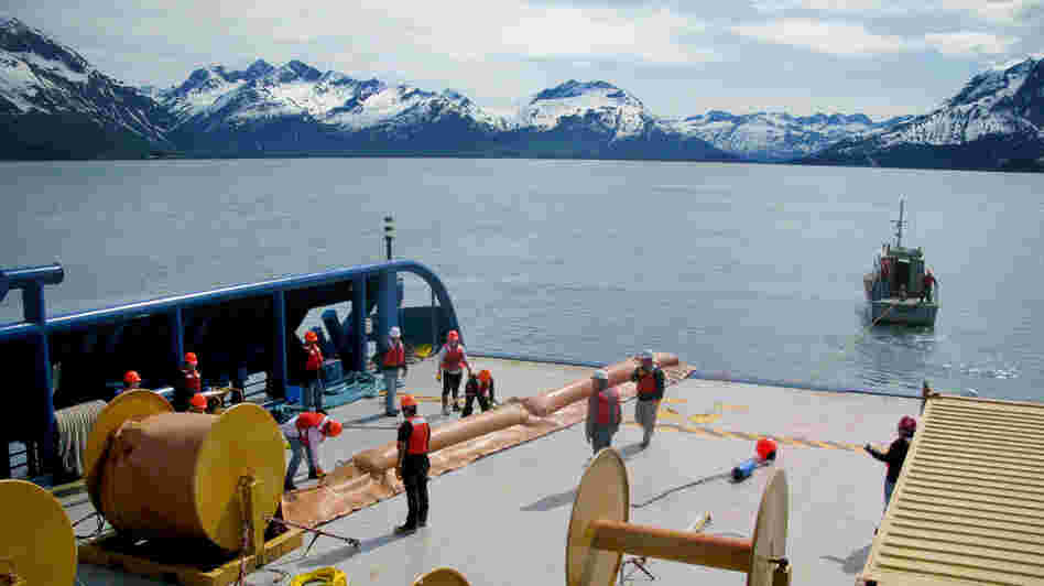 Trainees with Royal Dutch Shell learn to deploy oil spill booms in the waters near the port of Valdez in Alaska. The company is training about 200 spill responders. Trainees with Royal Dutch Shell learn to deploy oil spill booms in the waters near the port of Valdez in Alaska. The company is training about 200 spill responders.