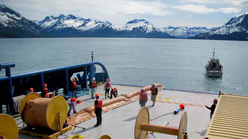Trainees with Royal Dutch Shell learn to deploy oil spill booms in the waters near the port of Valdez in Alaska. The company is training about 200 spill responders. Trainees with Royal Dutch Shell learn to deploy oil spill booms in the waters near the port of Valdez in Alaska. The company is training about 200 spill responders.