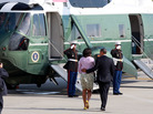 President Obama and first lady Michelle Obama board Marine One at John F. Kennedy International Airport in New York on Thursday. The Obamas were in New York for  fundraisers and a tour of One World Trade Center.