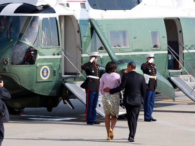 President Obama and first lady Michelle Obama board Marine One at John F. Kennedy International Airport in New York on Thursday. The Obamas were in New York for  fundraisers and a tour of One World Trade Center.