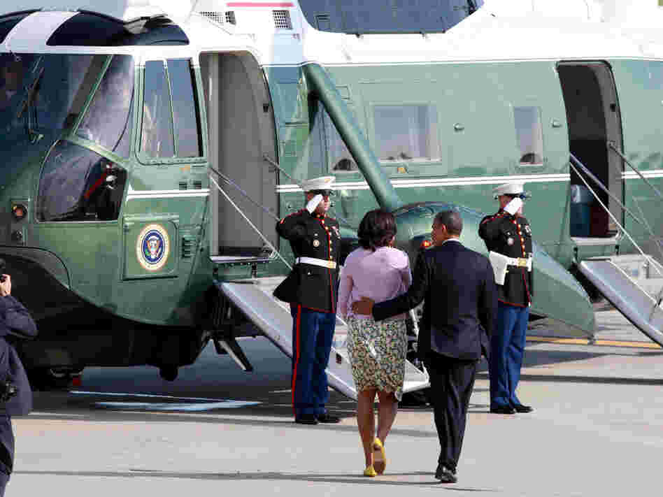 President Obama and first lady Michelle Obama board Marine One at John F. Kennedy International Airport in New York on Thursday. The Obamas were in New York for  fundraisers and a tour of One World Trade Center.