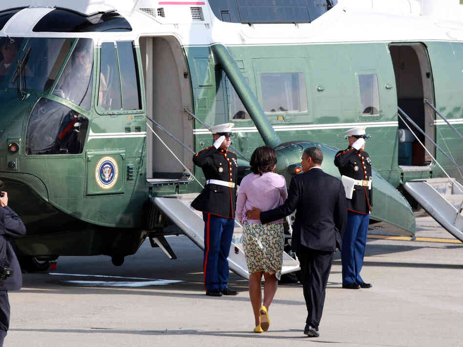 President Obama and first lady Michelle Obama board Marine One at John F. Kennedy International Airport in New York on Thursday. The Obamas were in New York for  fundraisers and a tour of One World Trade Center.