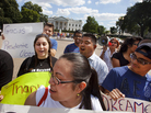 Supporters of President Obama's announcement on immigration policy rally outside the White House Friday. Supporters of President Obama's announcement on immigration policy rally outside the White House Friday.