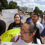 Supporters of President Obama's announcement on immigration policy rally outside the White House Friday. Supporters of President Obama's announcement on immigration policy rally outside the White House Friday.