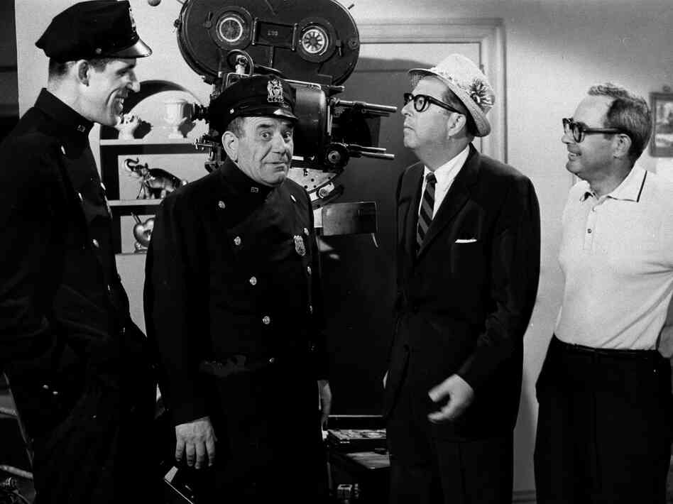 From left, Gwynne and Ross kibbitz with Phil Silvers of Sgt. Bilko and Nat Hiken, who created both classic TV comedies.