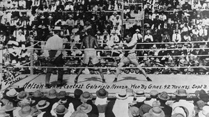 Joe Gans, left, defends his boxing title in 42 brutal rounds against Oscar "Battling" Nelson in Goldfield, Nev., on Sept. 3, 1906.