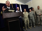 Navy reservist Capt. John Murphy (L), former chief prosecutor of military commissions at Guantanamo Bay, speaks during a press conference in 2009. Navy reservist Capt. John Murphy (L), former chief prosecutor of military commissions at Guantanamo Bay, speaks during a press conference in 2009.