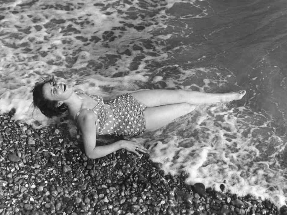 Yvonne Lockyer in her bathing costume in 1952, looking as if she just washed up on the beach.