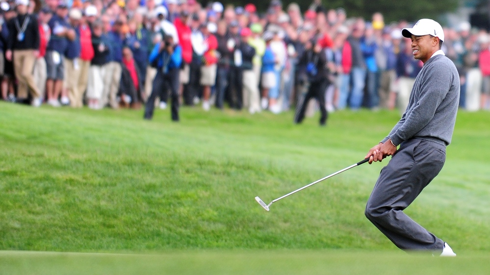 Tiger Woods reacts to a missed putt on the 13th hole on the first day of the US Open at San Francisco's Olympic Club.