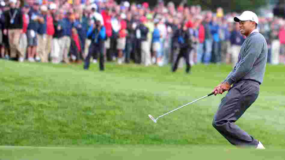Tiger Woods reacts to a missed putt on the 13th hole on the first day of the US Open at San Francisco's Olympic Club.