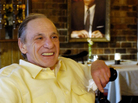 Henry Hill sits in the dining room of the Firefly restaurant in North Platte, Neb., in 2005. A portrait of actor Ray Liotta portraying Hill in the movie Goodfellas hangs on the wall behind him. Henry Hill sits in the dining room of the Firefly restaurant in North Platte, Neb., in 2005. A portrait of actor Ray Liotta portraying Hill in the movie Goodfellas hangs on the wall behind him.
