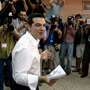 Alexis Tsipras, leader of Syriza Party, casts his vote at a polling station in Athens, Greece. Alexis Tsipras, leader of Syriza Party, casts his vote at a polling station in Athens, Greece.