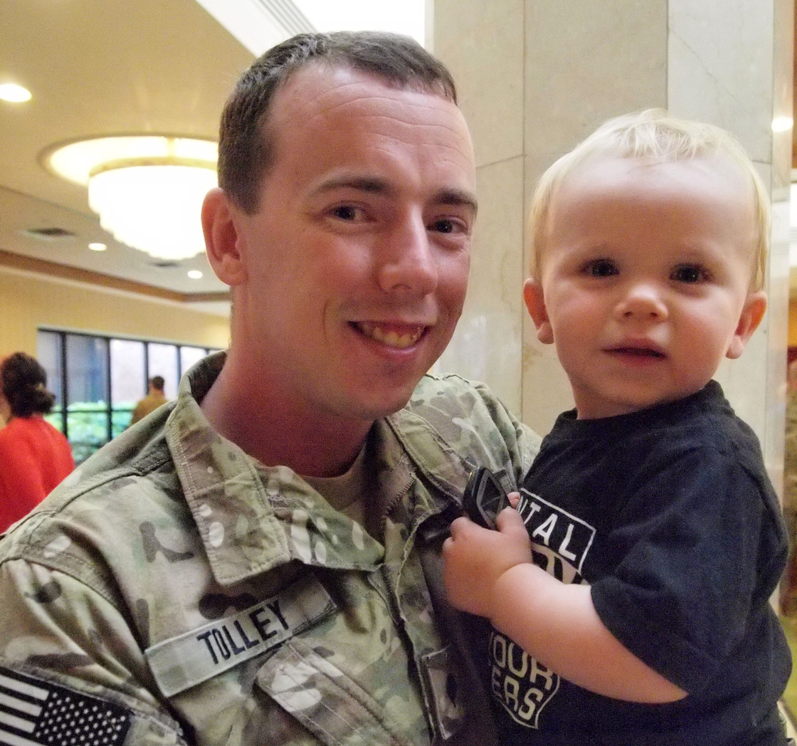Spc. Bryan Tolley and his 18-month-old son, Ryan. Tolley says that while deployed he would see children that reminded him of Ryan and immediately call home.