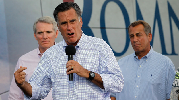 Republican presidential candidate Mitt Romney campaigns with Sen. Rob Portman of Ohio (left) and House Speaker John Boehner on Sunday in Troy, Ohio.