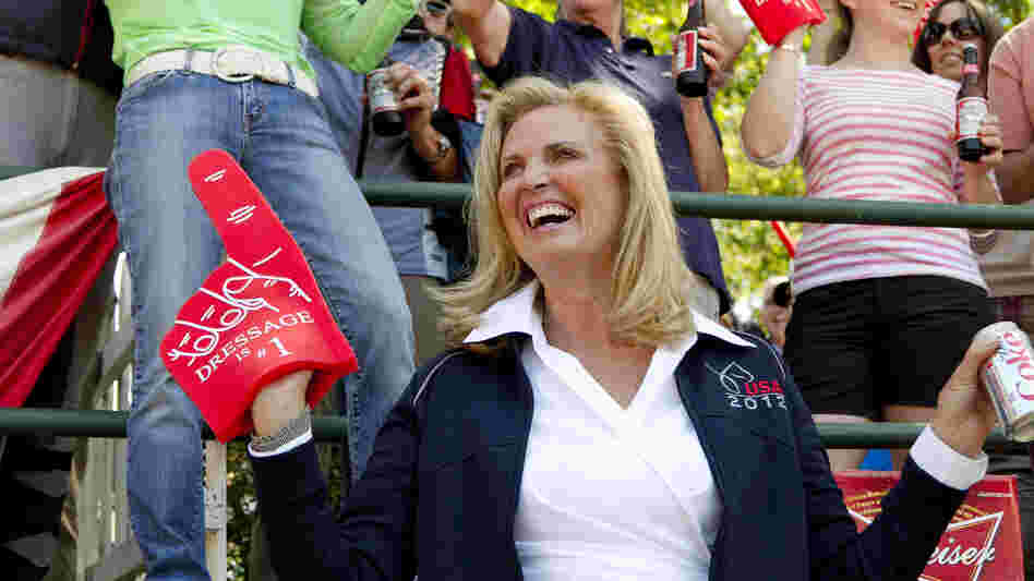 Ann Romney, wife of Republican presidential candidate Mitt Romney, wears a "Dressage is no. 1" foam finger at a competition on Saturday. Romney's horse, Rafalca, qualified for the 2012 Olympic dressage team.