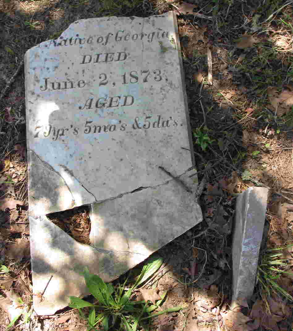The headstone for Benjamin Taylor, who died in 1873. Taylor helped drive a wagon train for pioneers who settled in Northern California's Green Valley in 1850. His headstone has  been pieced together after being found under a foot of dirt. Caretaker Tony Pires says he hopes to find the missing piece.