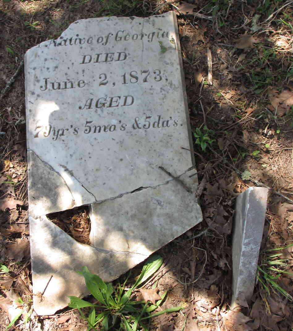 The headstone for Benjamin Taylor, who died in 1873. Taylor helped drive a wagon train for pioneers who settled in Northern California's Green Valley in 1850. His headstone has  been pieced together after being found under a foot of dirt. Caretaker Tony Pires says he hopes to find the missing piece.