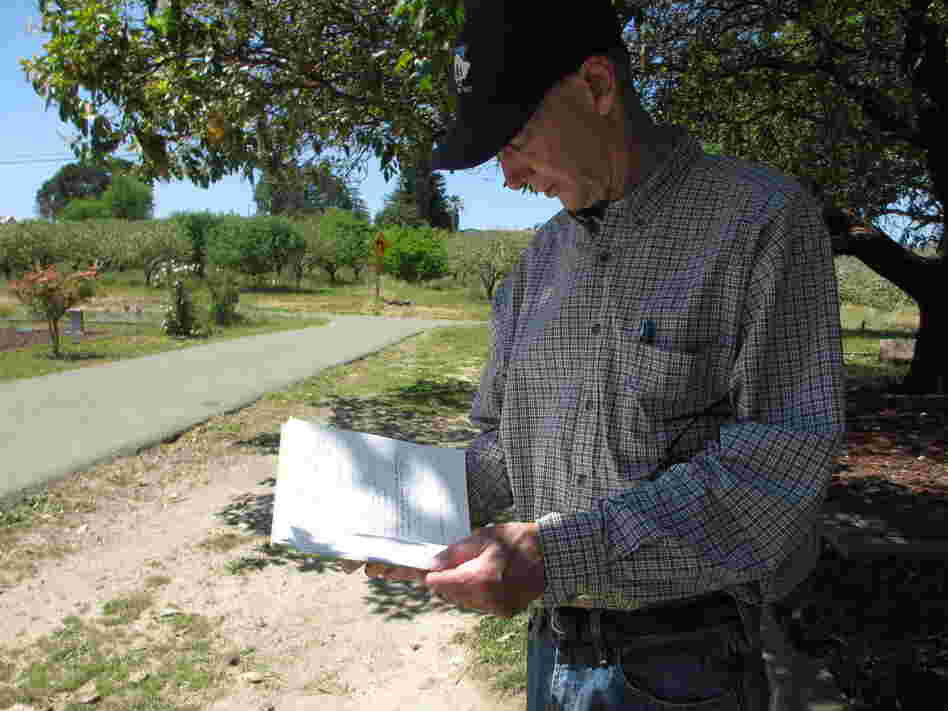 Seismologist Jack Boatwright checks his notes from 2006, when he determined that two-thirds of Gilliam's headstones had very likely been shattered during the 1906 earthquake. Back then, he didn't know that Tony Pires had been resurrecting buried headstones at the cemetery.