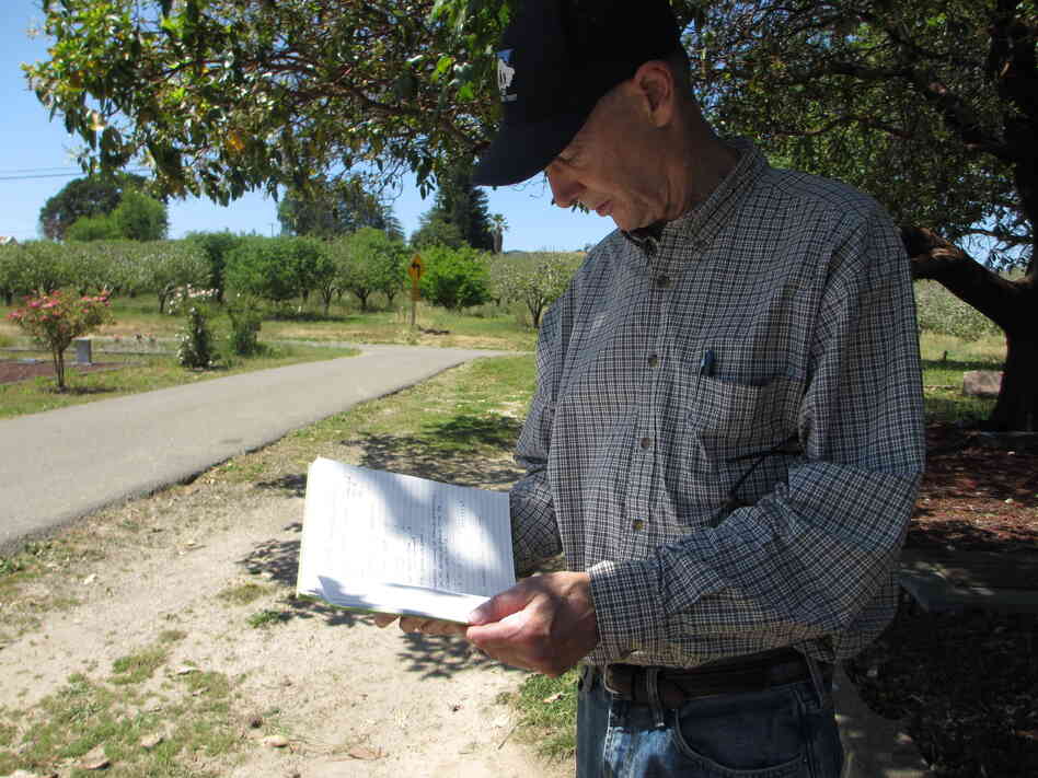 Seismologist Jack Boatwright checks his notes from 2006, when he determined that two-thirds of Gilliam's headstones had very likely been shattered during the 1906 earthquake. Back then, he didn't know that Tony Pires had been resurrecting buried headstones at the cemetery.