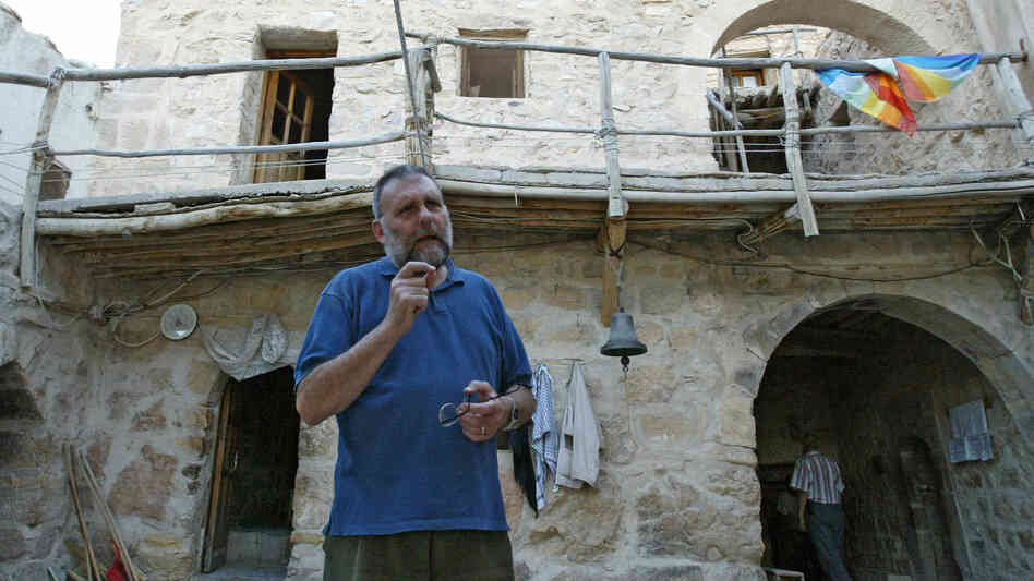 The Italian Jesuit priest Paolo Dall'Oglio, shown here at the Syrian Maronite monastery of Deir Mar Musa in 2007, lived in Syria for 30 years before he was expelled Saturday. Dall'Oglio has spoken out in support of protesters who oppose President Bashar Assad. The Italian Jesuit priest Paolo Dall'Oglio, shown here at the Syrian Maronite monastery of Deir Mar Musa in 2007, lived in Syria for 30 years before he was expelled Saturday. Dall'Oglio has spoken out in support of protesters who oppose President Bashar Assad.