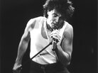 Paul Young onstage in London, 1983. Paul Young onstage in London, 1983.